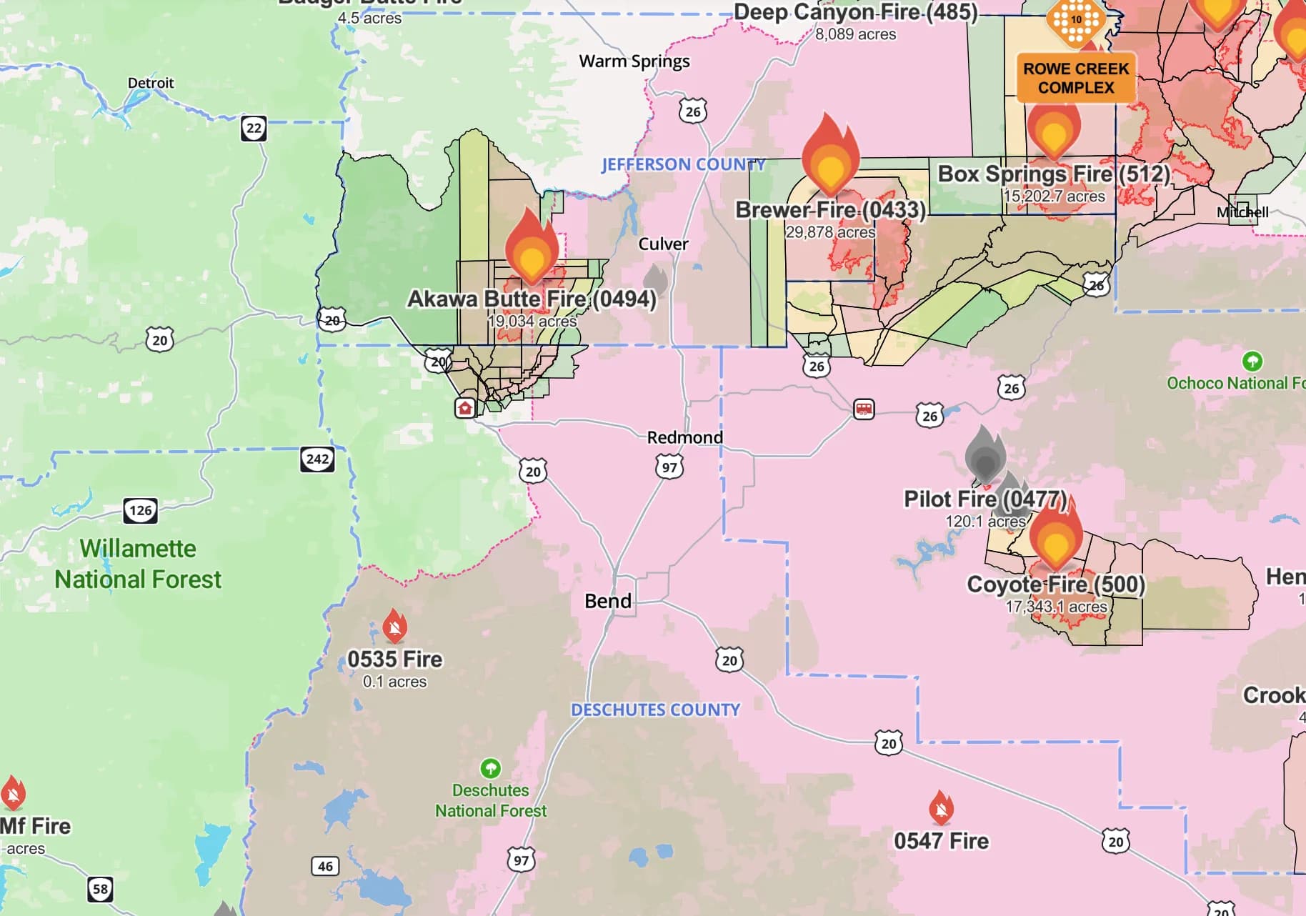 Map of Central Oregon showing active wildfire icons and affected acres around Bend and Redmond